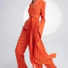 Peggy Iconic pleated tuxedo jacket in orange