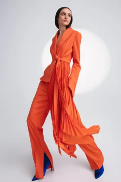 Peggy Iconic pleated tuxedo jacket in orange