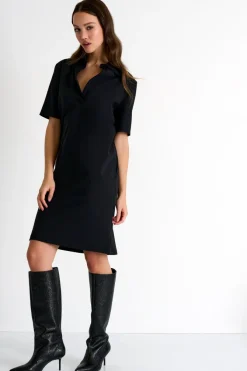 The Tunic Polo Dress in caviar
